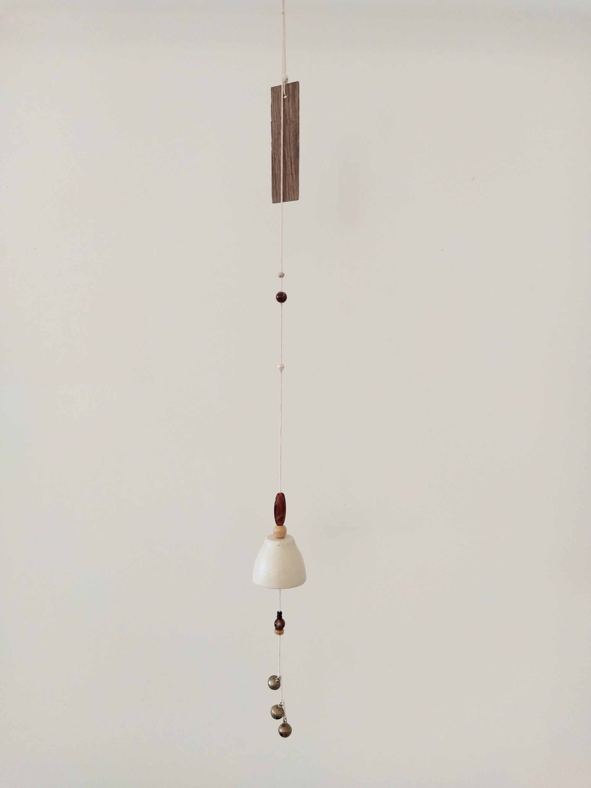 Décoration artisanale à suspendre de la collection son de cloche