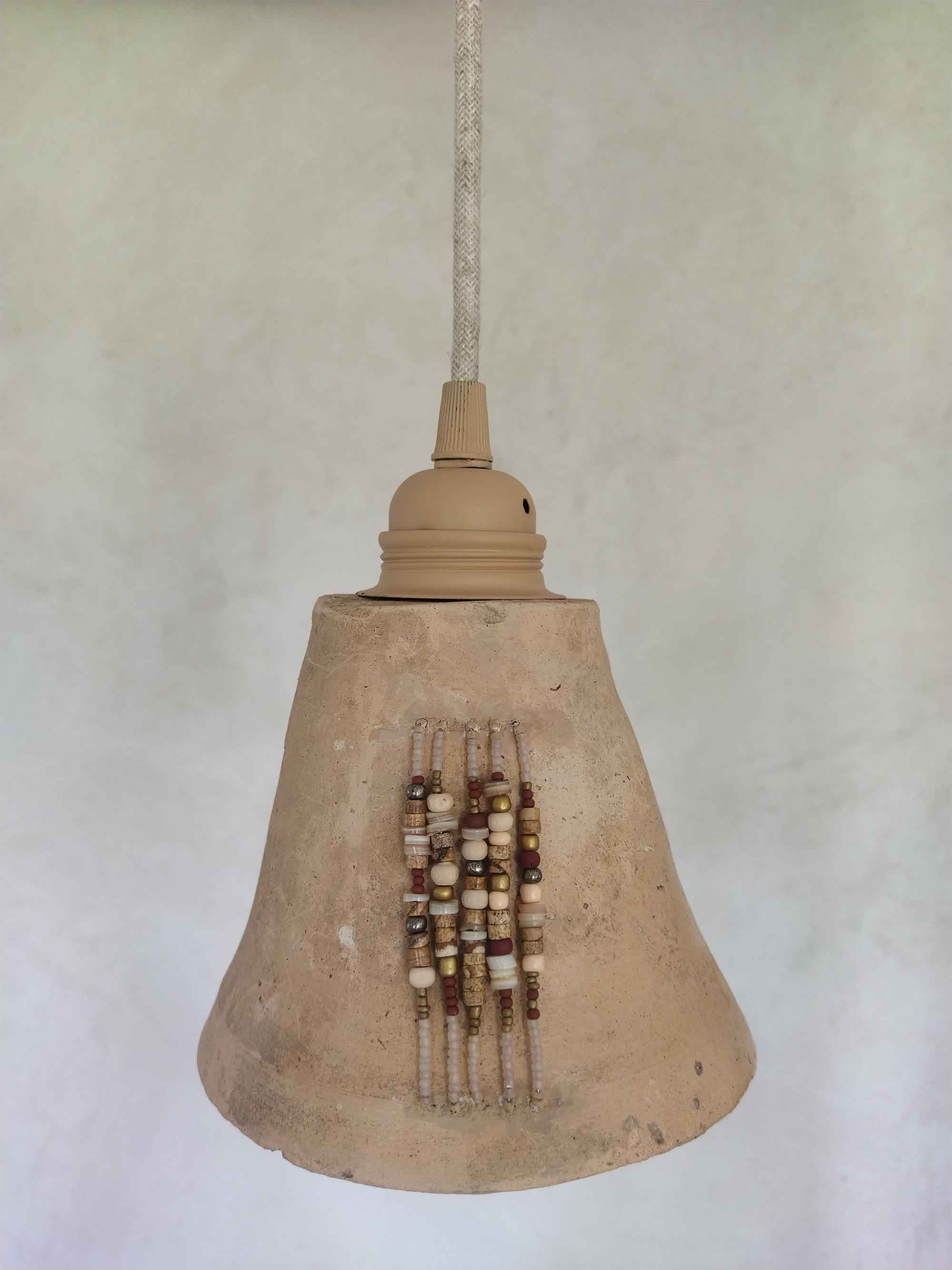 Luminaires suspensions vagadonde de style bohème en terre cuite