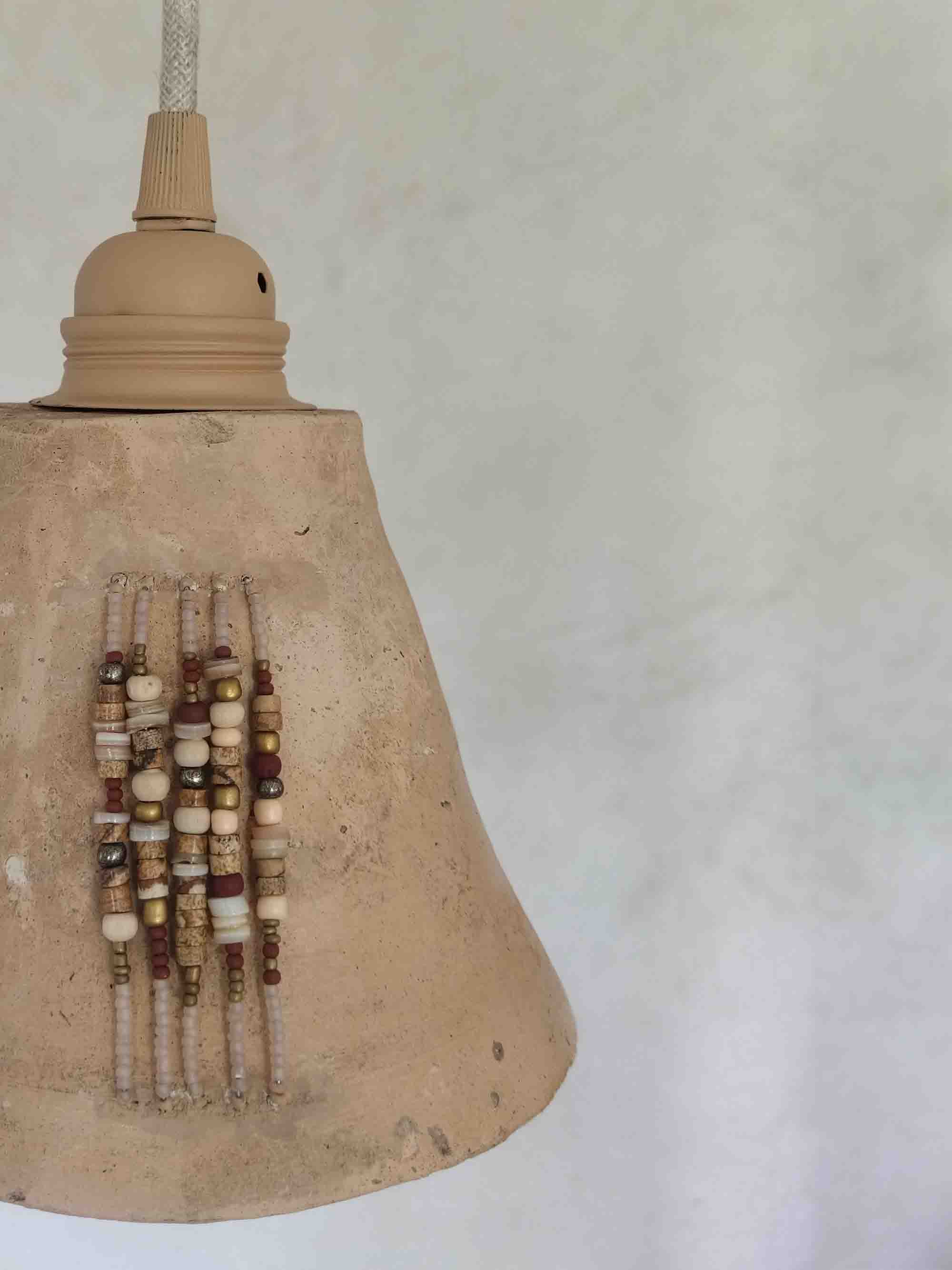 Luminaires suspensions vagadonde de style bohème en terre cuite